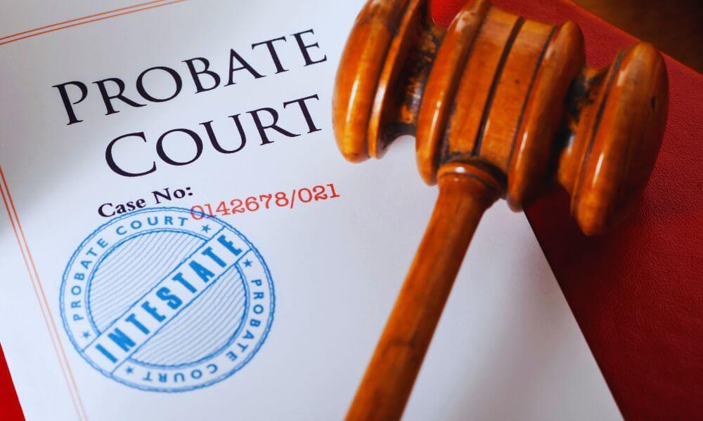 Probate court case document with wooden gavel and red folder representing estate administration process in Bluffton, South Carolina.