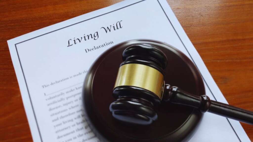 Living will declaration in South Carolina with a judge’s gavel on a wooden desk.